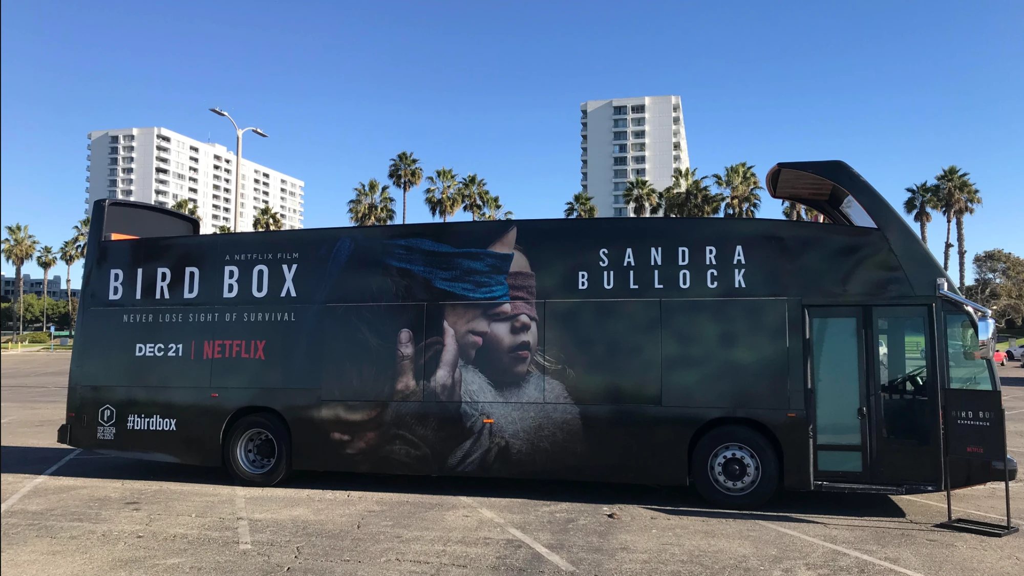 The Bird Box bus, wrapped in the film’s key art, on location in Los Angeles in December 2018